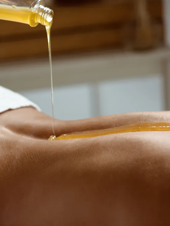 honey-pouring-woman-s-naked-back-spa-salon.jpg